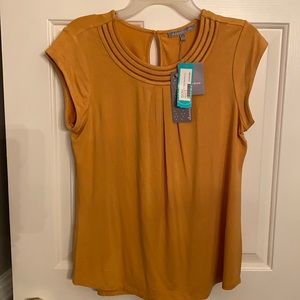 Never worn scoop neck top.